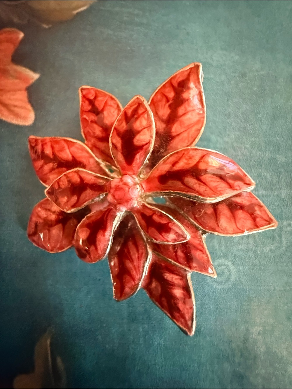 Red poinsettia brooch